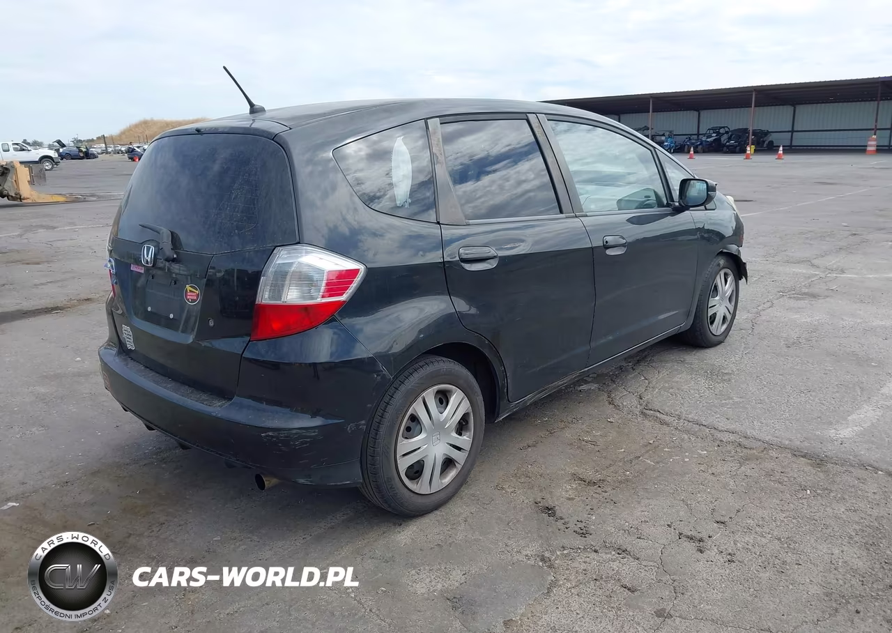 2009 Honda Fit VIN:JHMGE88249S058035 - 4