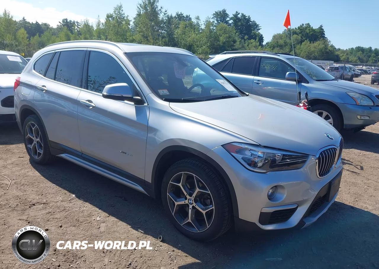 2018 BMW X1 xDrive28I VIN:WBXHT3C33J5K25263 - 1