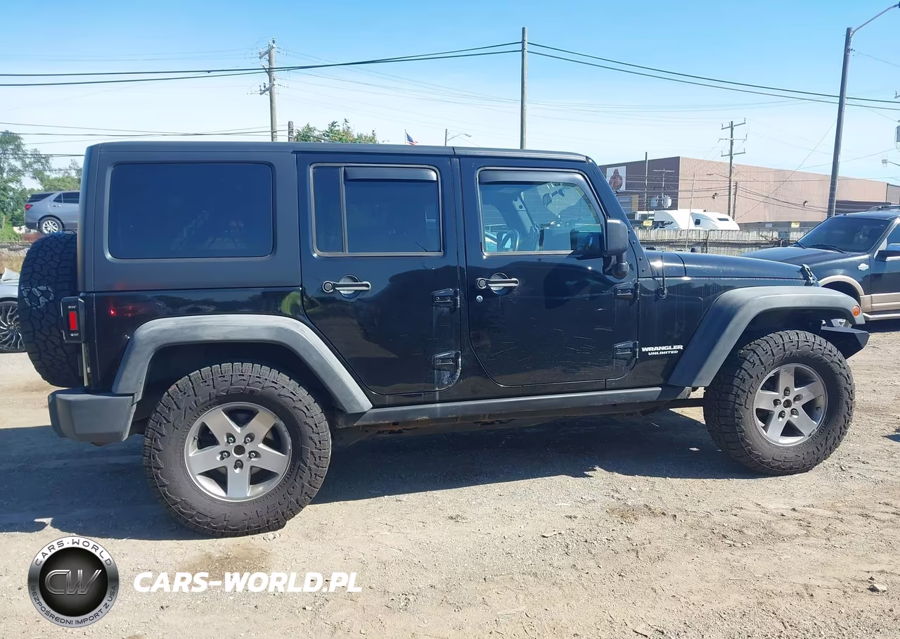2012 Jeep Wrangler Unlimited Rubicon VIN:1C4BJWFGXCL125331 - 13