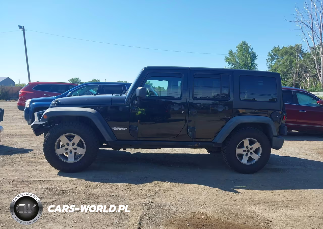 2012 Jeep Wrangler Unlimited Rubicon VIN:1C4BJWFGXCL125331 - 14