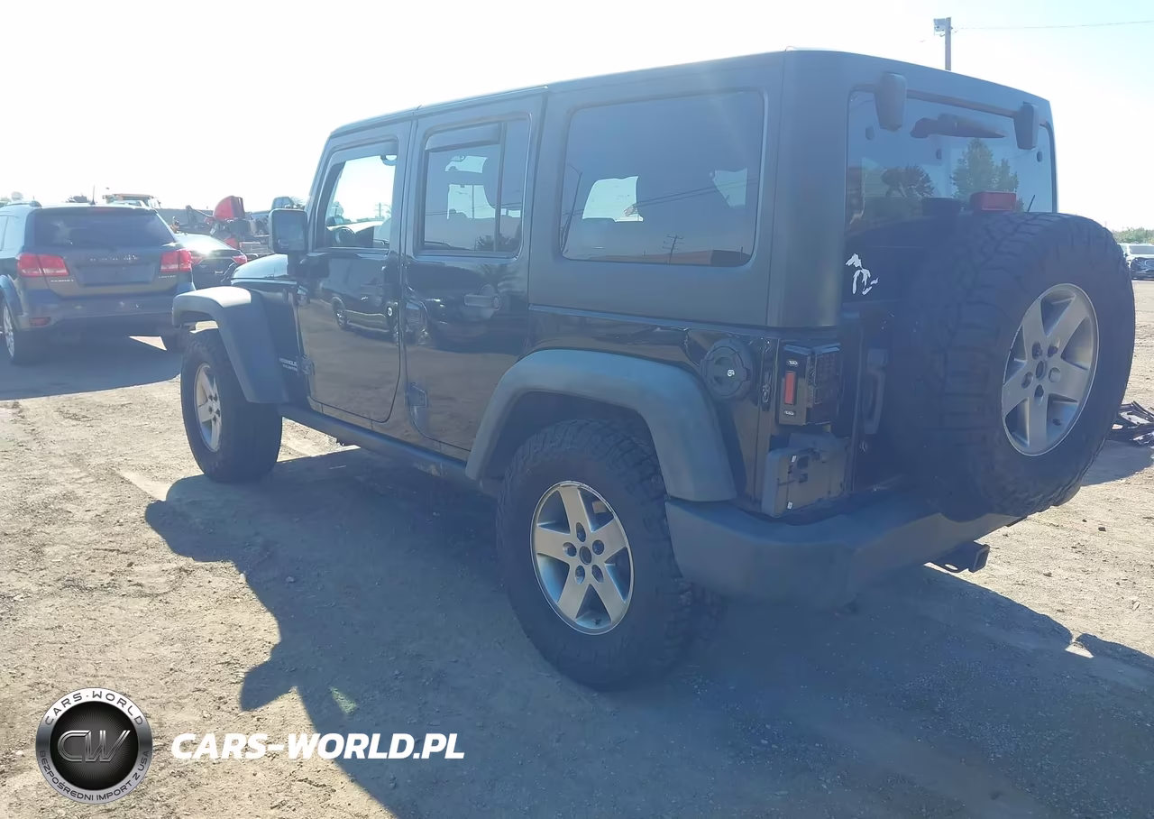 2012 Jeep Wrangler Unlimited Rubicon VIN:1C4BJWFGXCL125331 - 3