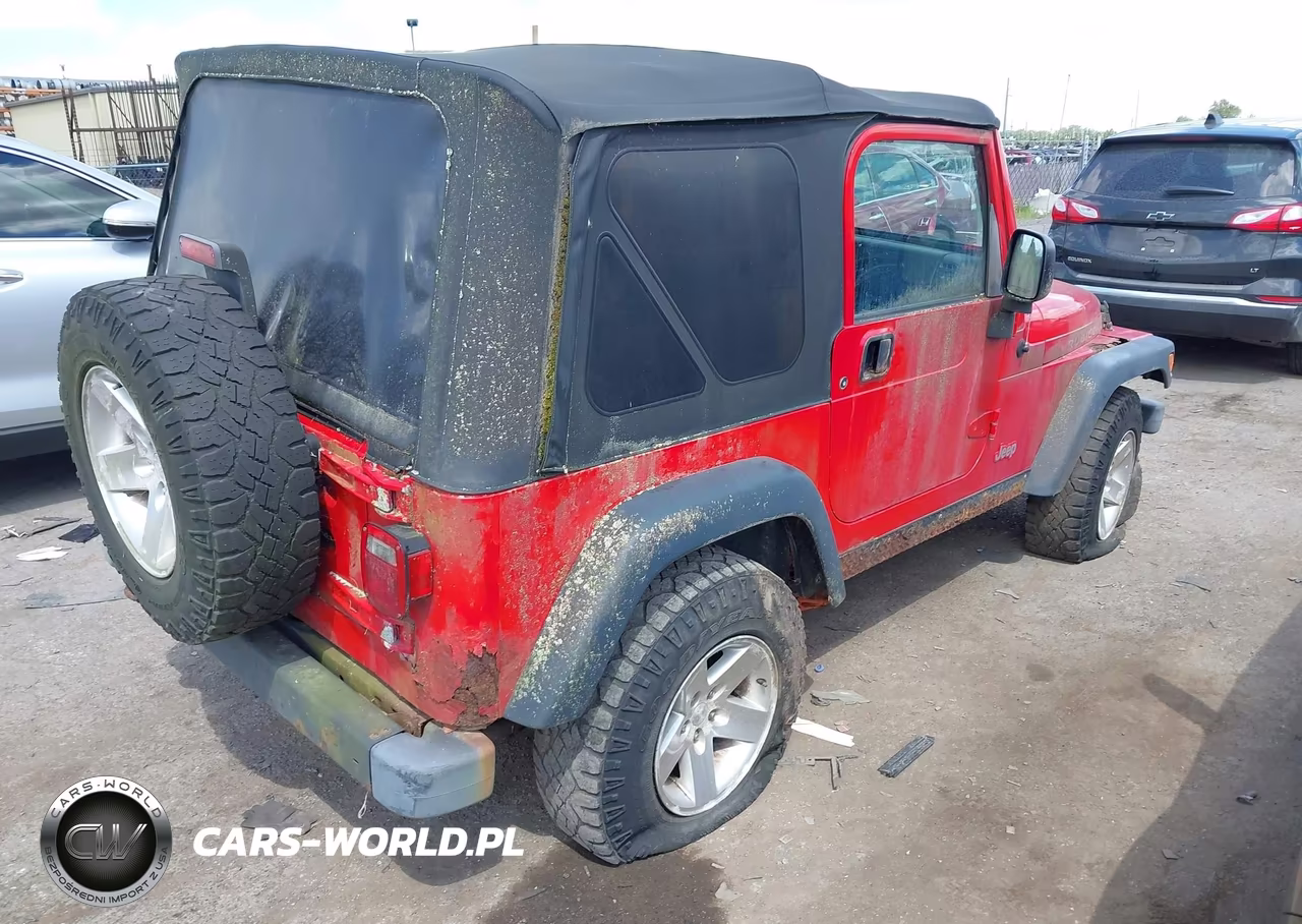 2004 Jeep Wrangler Rubicon VIN:1J4FA69S44P708337 - 4