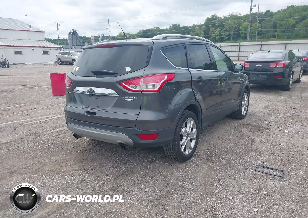 2016 Ford Escape Titanium VIN:1FMCU9J99GUA64765 - 4