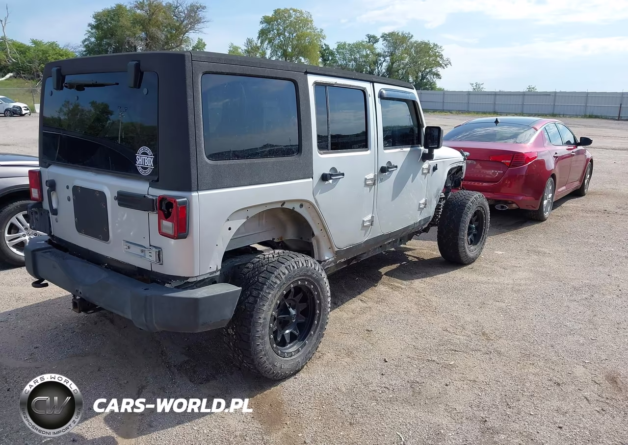 2011 Jeep Wrangler Unlimited Sport VIN:1J4BA3H17BL552837 - 4