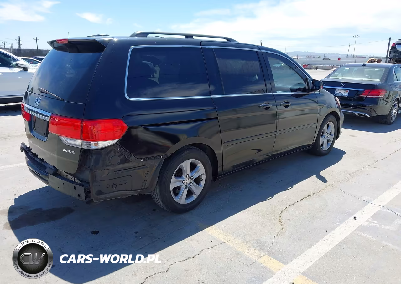 2010 Honda Odyssey Touring VIN:5FNRL3H98AB104614 - 4