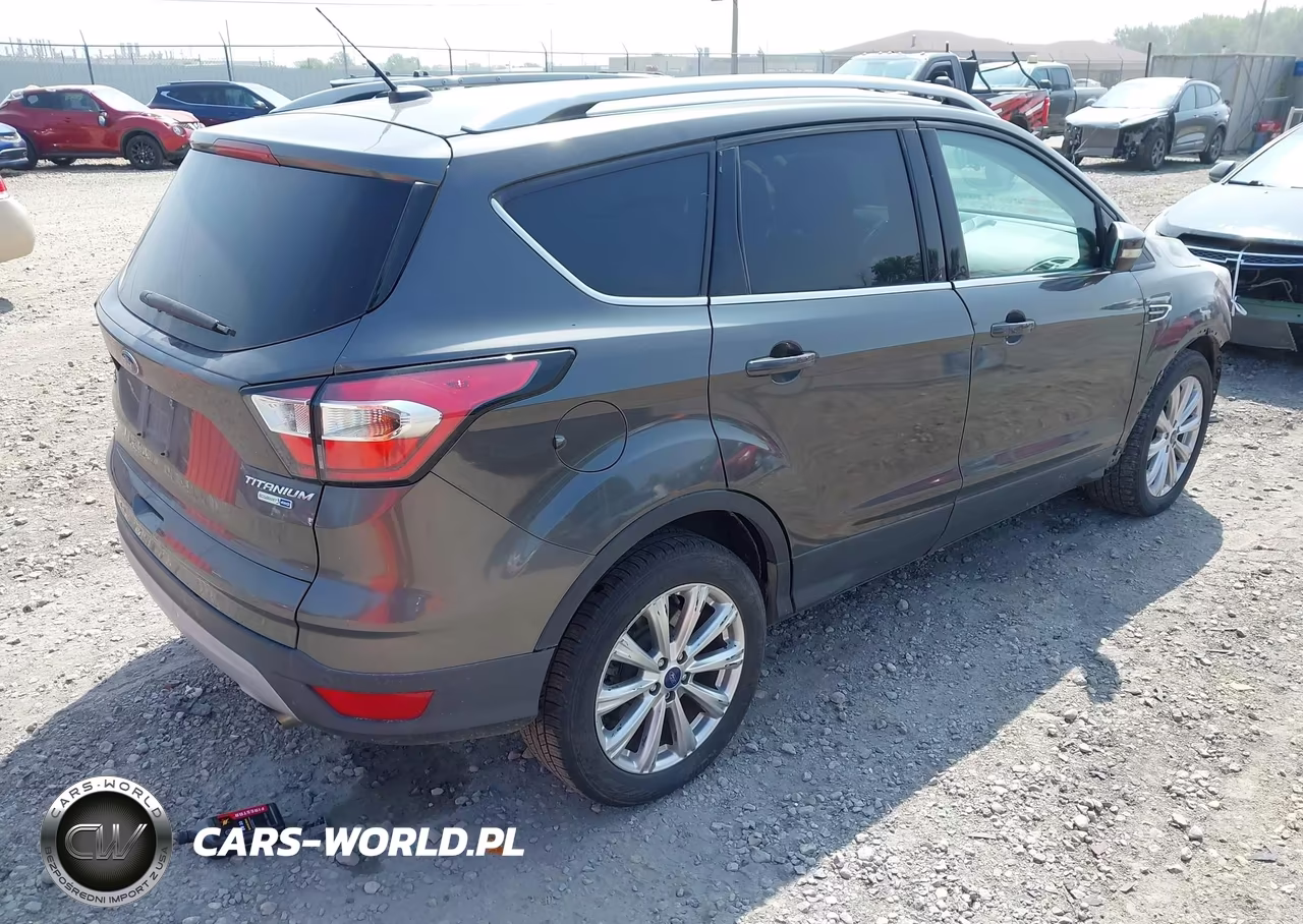 2017 Ford Escape Titanium VIN:1FMCU9JD0HUD21396 - 4