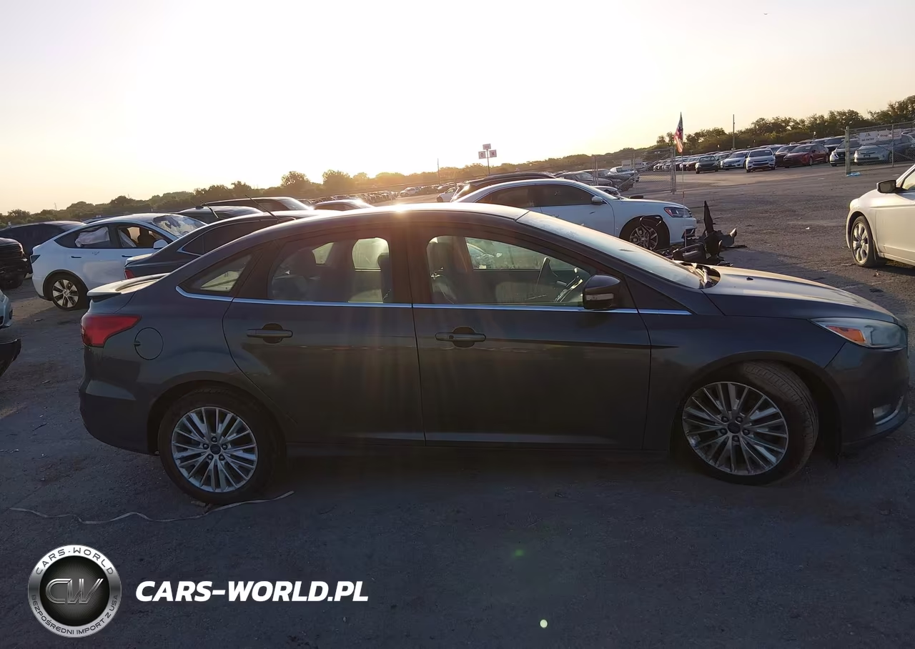 2015 Ford Focus Titanium VIN:1FADP3J22FL370023 - 13