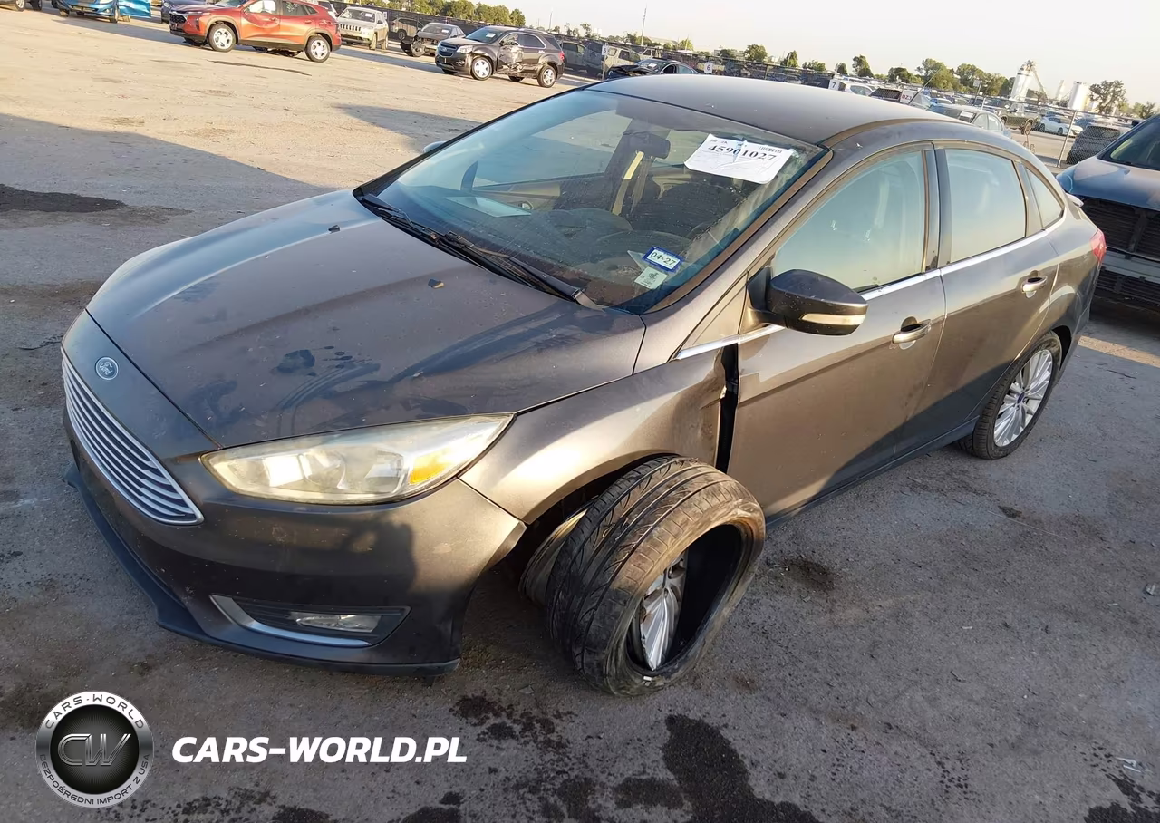 2015 Ford Focus Titanium VIN:1FADP3J22FL370023 - 2