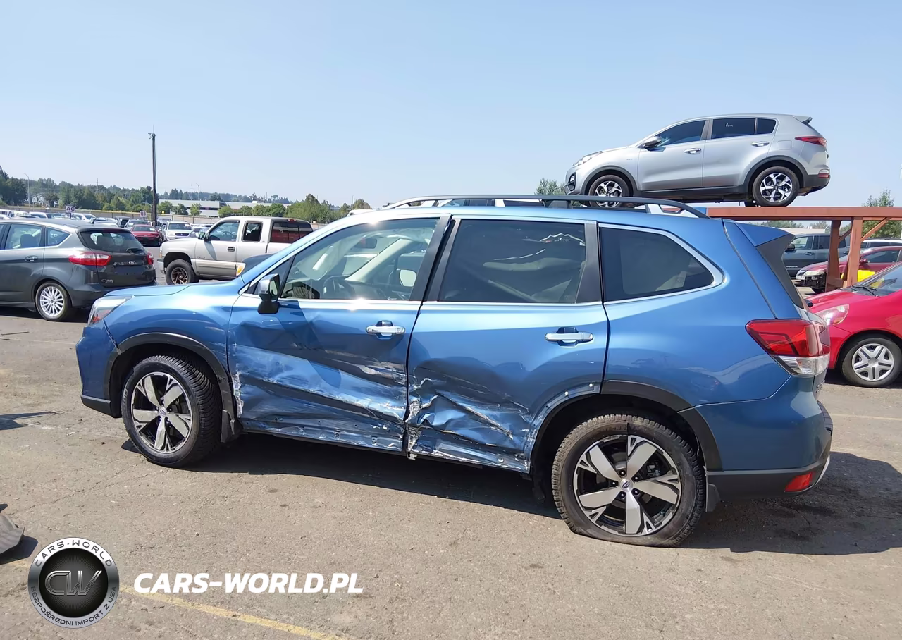 2019 Subaru Forester Touring VIN:JF2SKAWCXKH585671 - 14