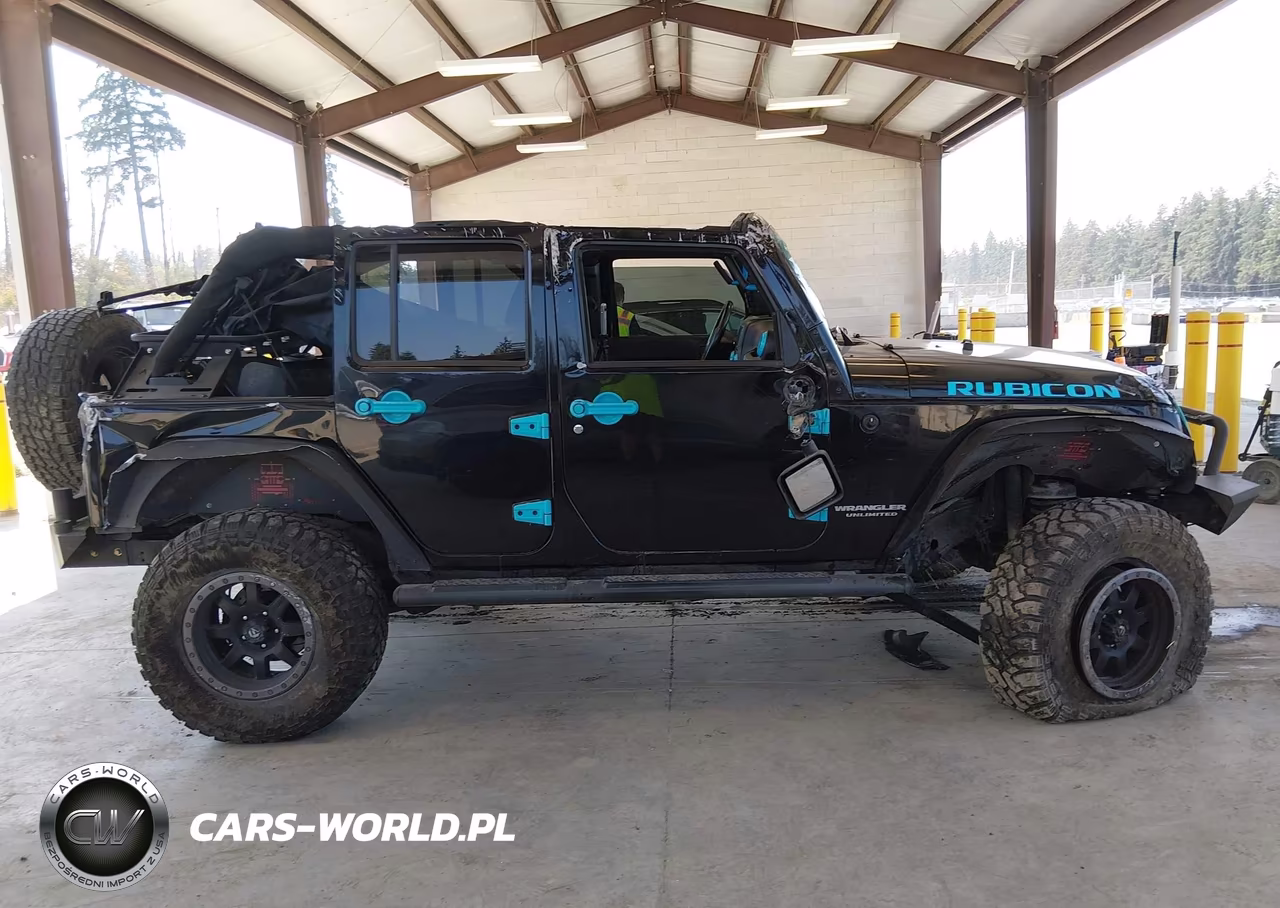 2013 Jeep Wrangler Unlimited Rubicon VIN:1C4HJWFG7DL662086 - 13