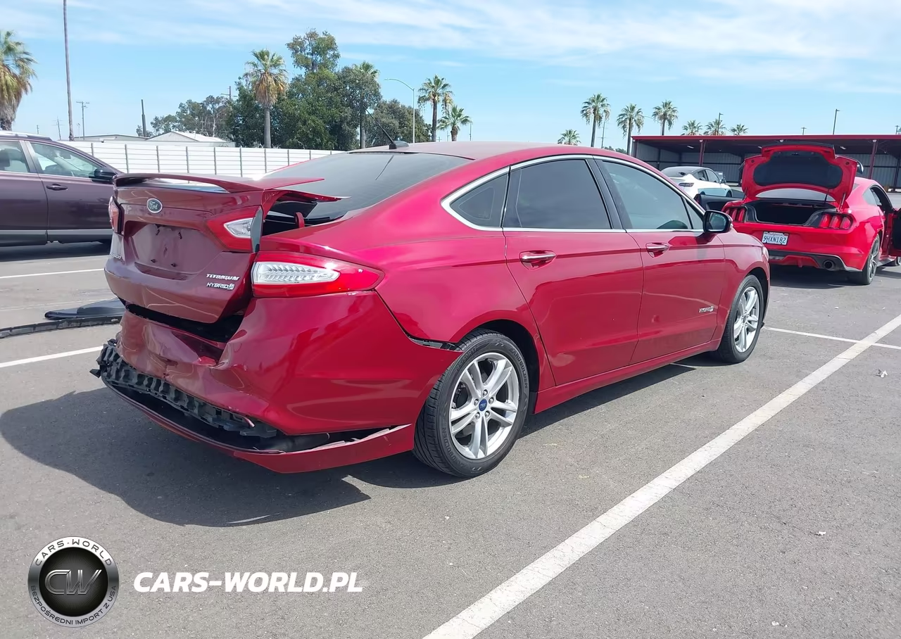 2016 Ford Fusion Hybrid Titanium VIN:3FA6P0RUXGR282434 - 4