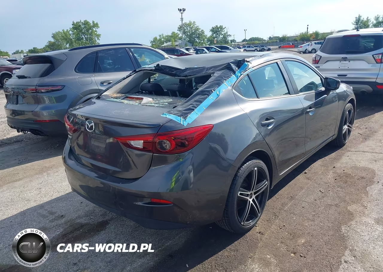 2014 Mazda Mazda3 S Grand Touring VIN:JM1BM1W36E1125106 - 4