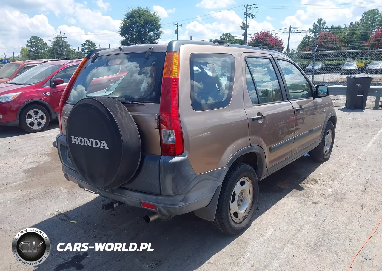 2002 Honda Cr-V Lx VIN:JHLRD78562C056694 - 4