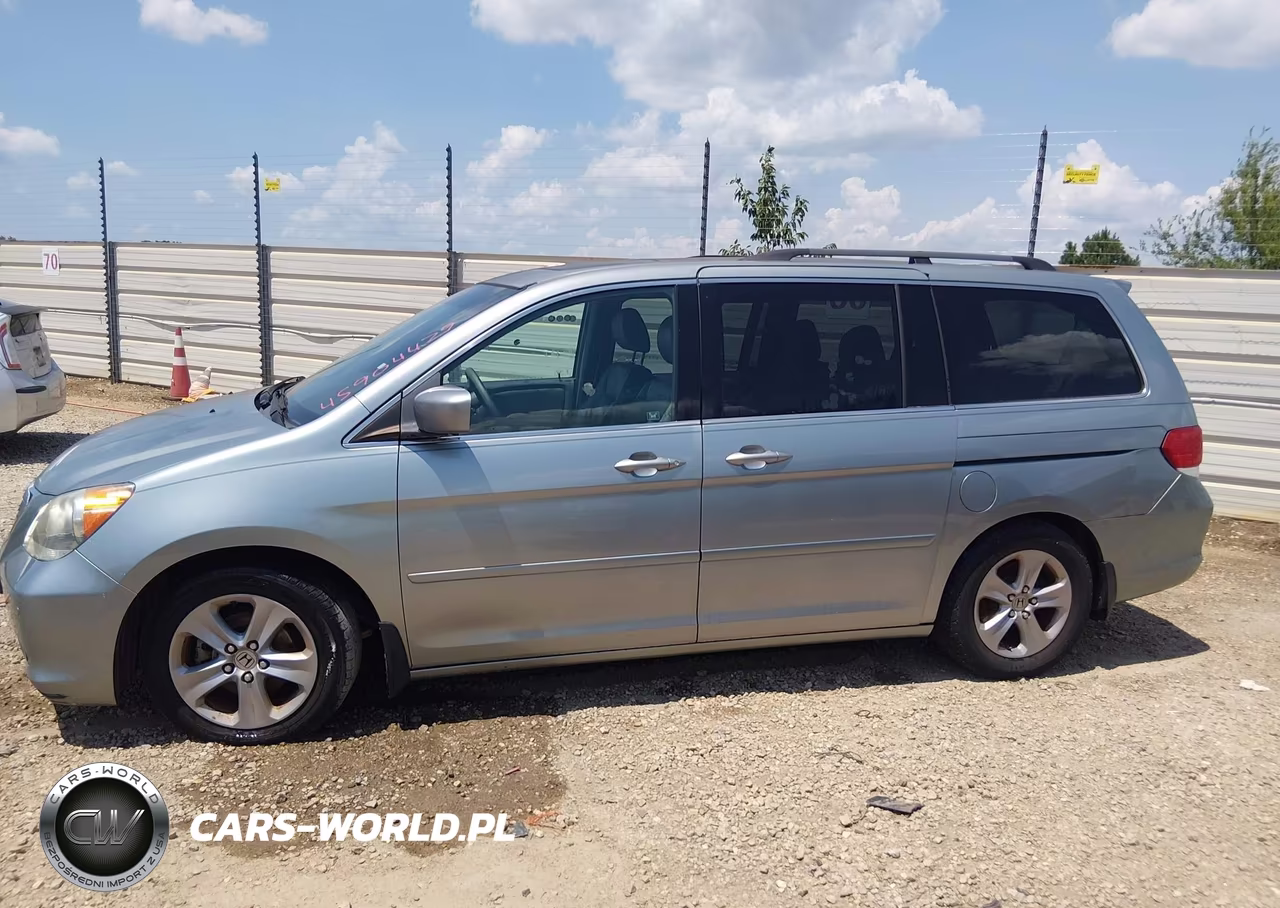 2010 Honda Odyssey Touring VIN:5FNRL3H96AB061763 - 14