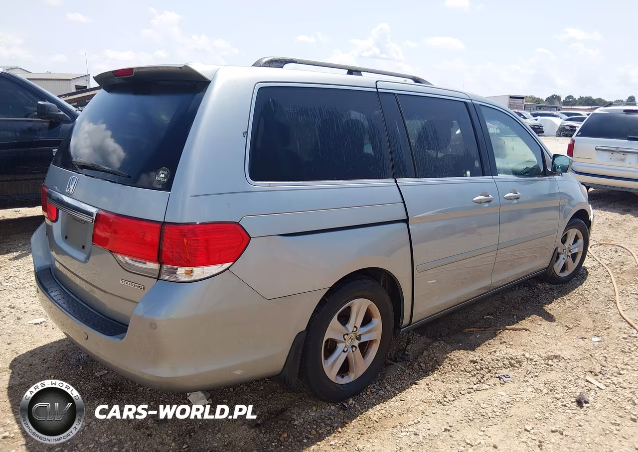 2010 Honda Odyssey Touring VIN:5FNRL3H96AB061763 - 4