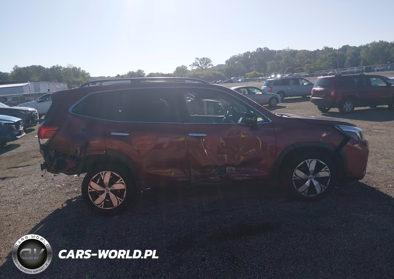 2019 Subaru Forester Touring VIN:JF2SKAWC6KH556099 - 14