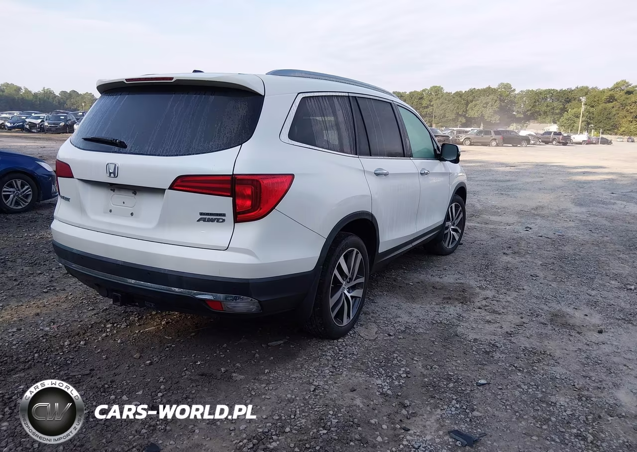 2017 Honda Pilot Touring VIN:5FNYF6H96HB098357 - 4