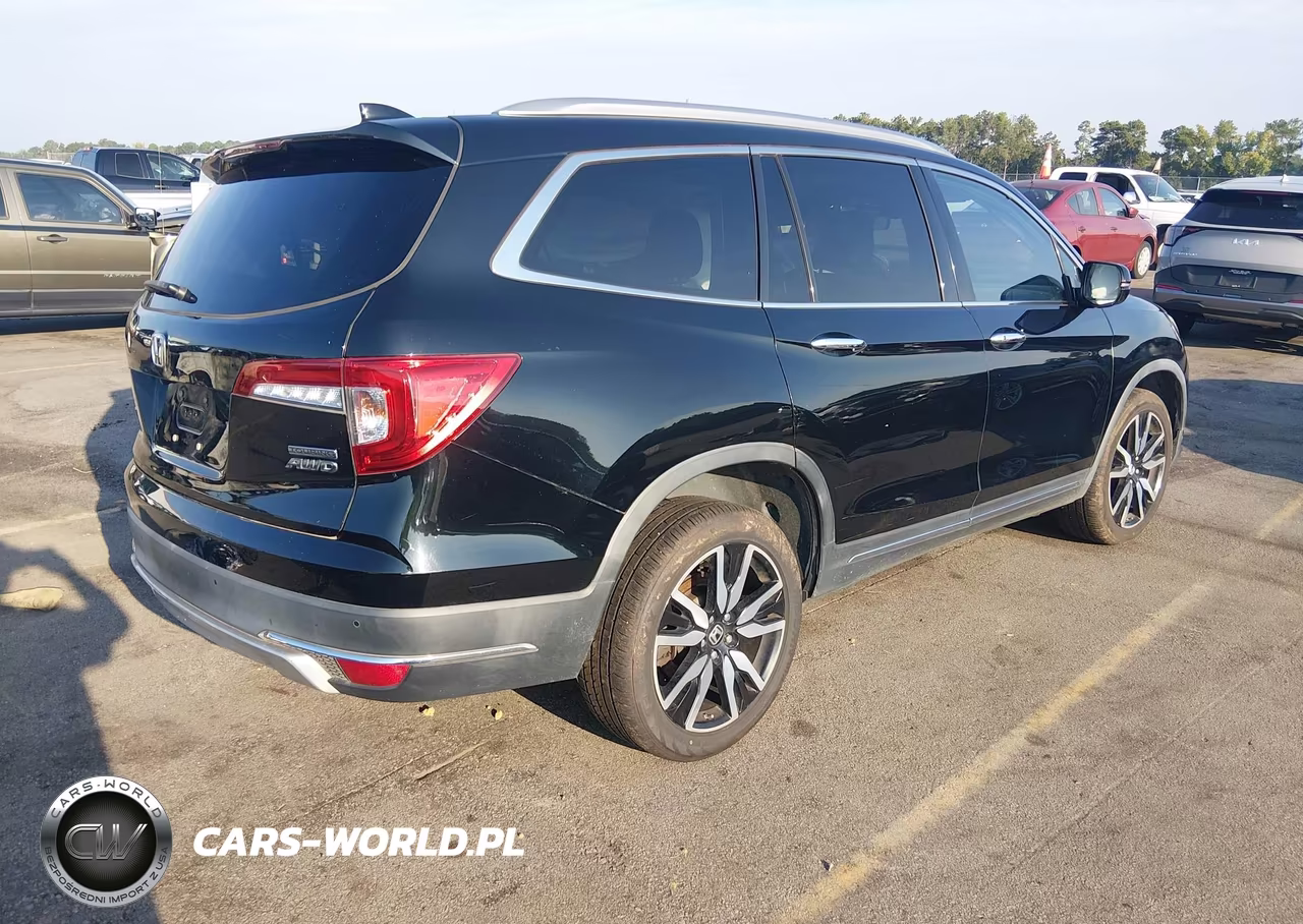 2019 Honda Pilot Touring VIN:5FNYF6H96KB034004 - 4