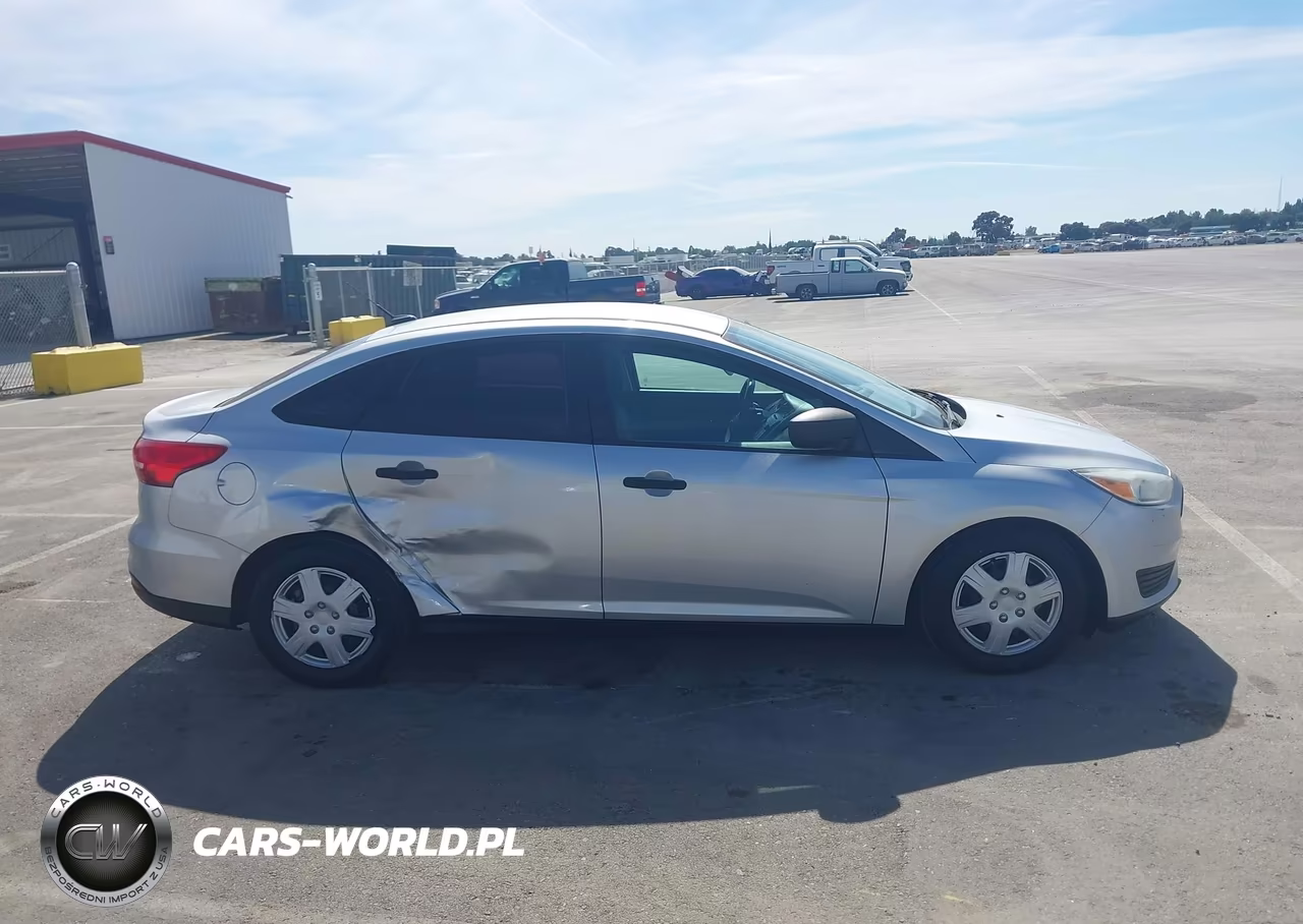 2016 Ford Focus S VIN:1FADP3E29GL276233 - 13