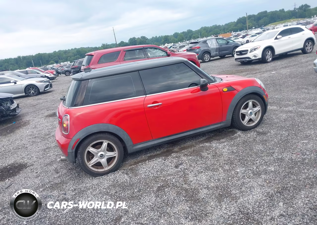 2009 Mini Cooper VIN:WMWMF33549TT69056 - 4