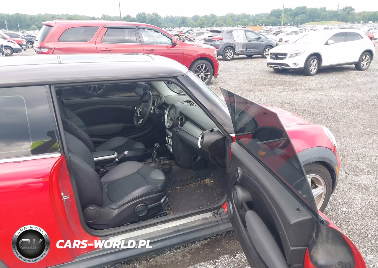 2009 Mini Cooper VIN:WMWMF33549TT69056 - 5