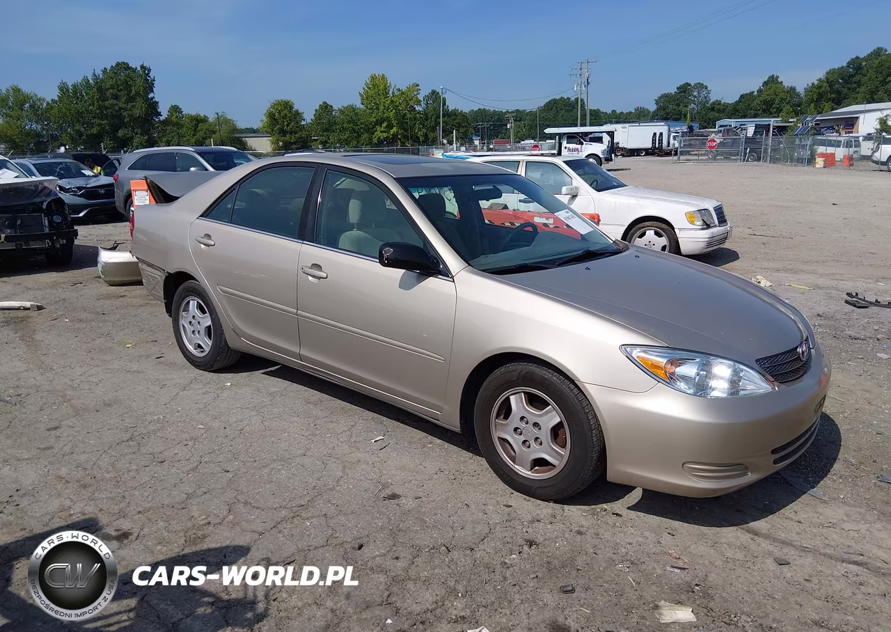 2002 Toyota Camry Le VIN:4T1BF30K22U536854 - 1