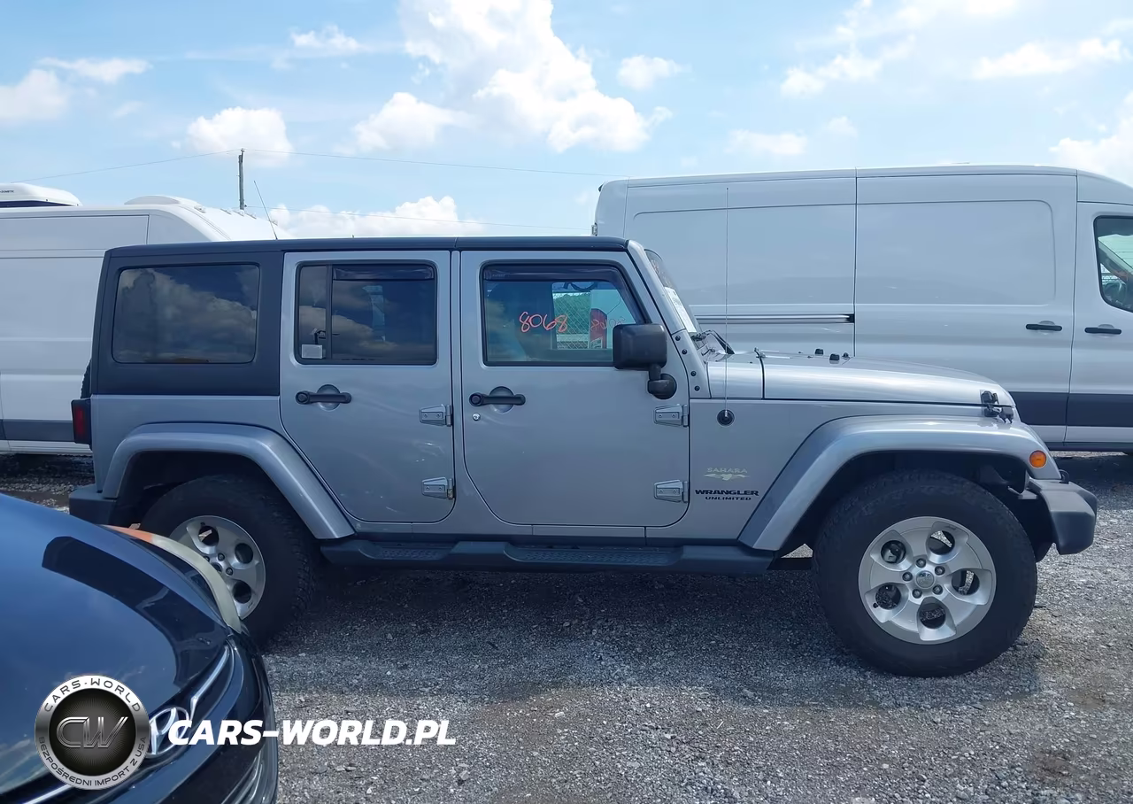 2015 Jeep Wrangler Unlimited Sahara VIN:1C4BJWEG7FL700409 - 13