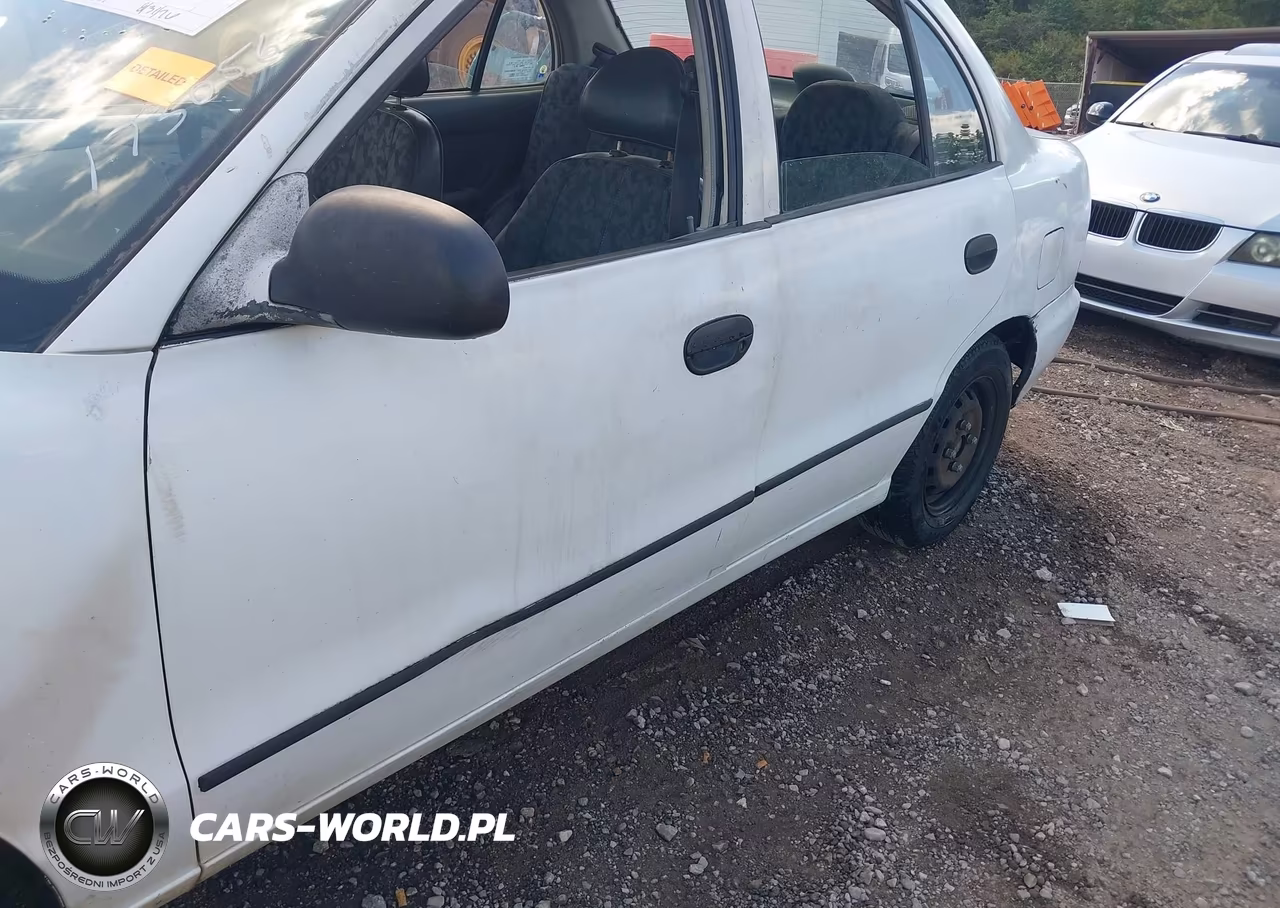 1995 Hyundai Accent VIN:KMHVF14N2SU173056 - 13