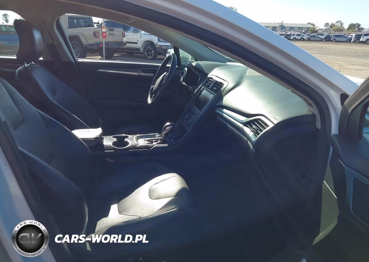 2016 Ford Fusion Titanium VIN:3FA6P0K95GR135329 - 5