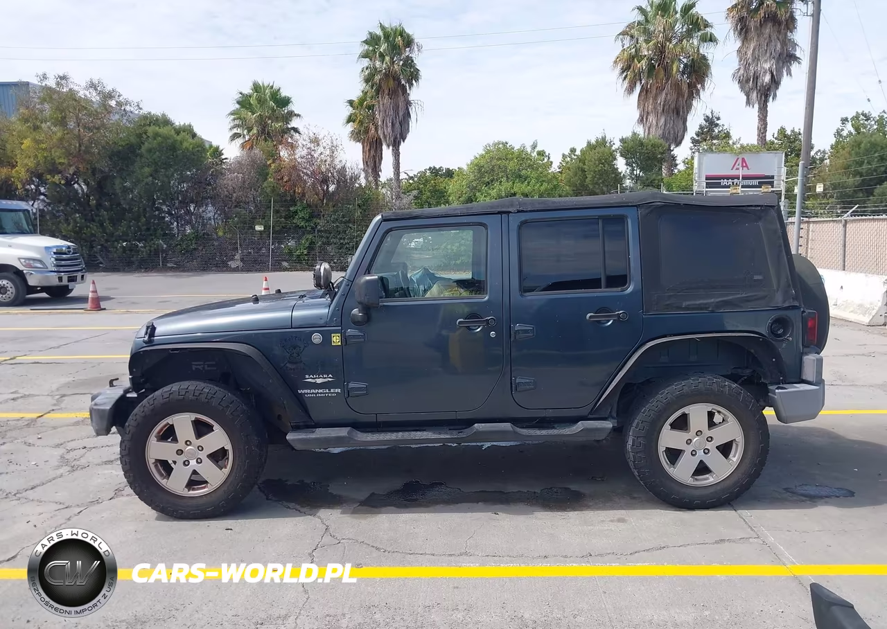 2007 Jeep Wrangler Unlimited Sahara VIN:1J4GA59127L162266 - 14