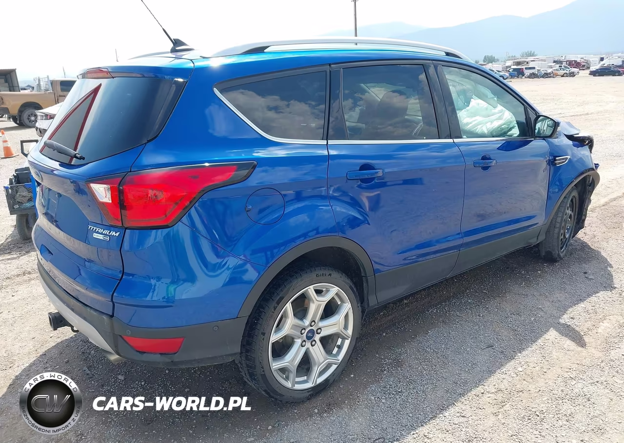 2019 Ford Escape Titanium VIN:1FMCU9J9XKUC55927 - 4