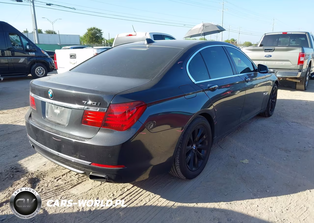 2015 BMW 740I VIN:WBAYA6C58FGK16301 - 4