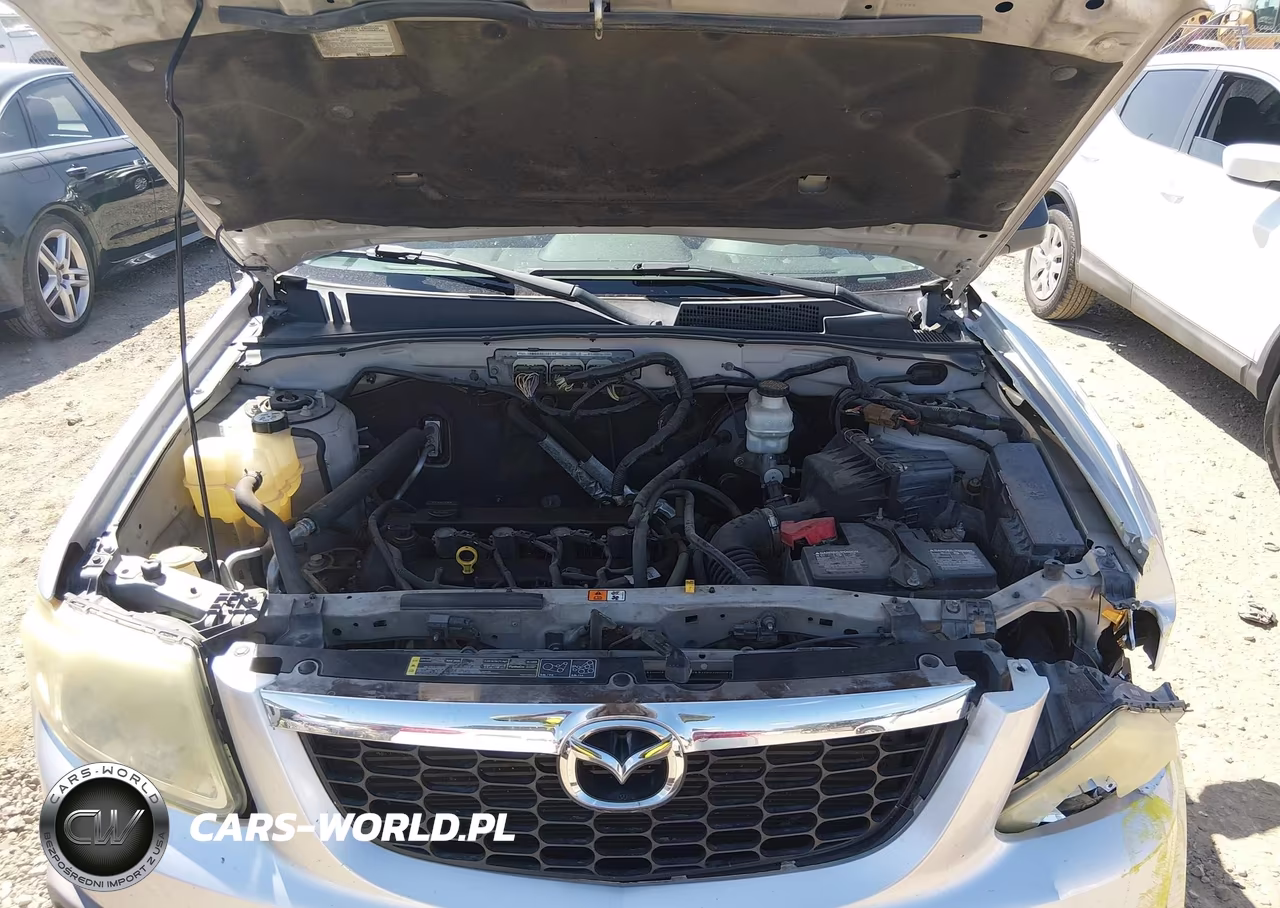 2010 Mazda Tribute I Sport VIN:4F2CY0C73AKM02776 - 10