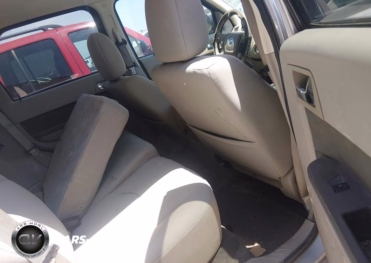 2009 Mercury Mariner V6 VIN:4M2CU81G49KJ20620 - 8