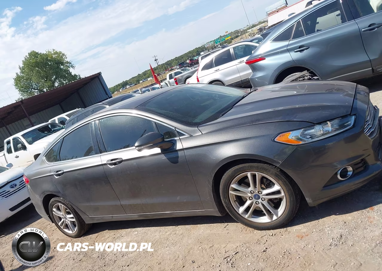 2016 Ford Fusion Energi Titanium VIN:3FA6P0SU5GR115117 - 13