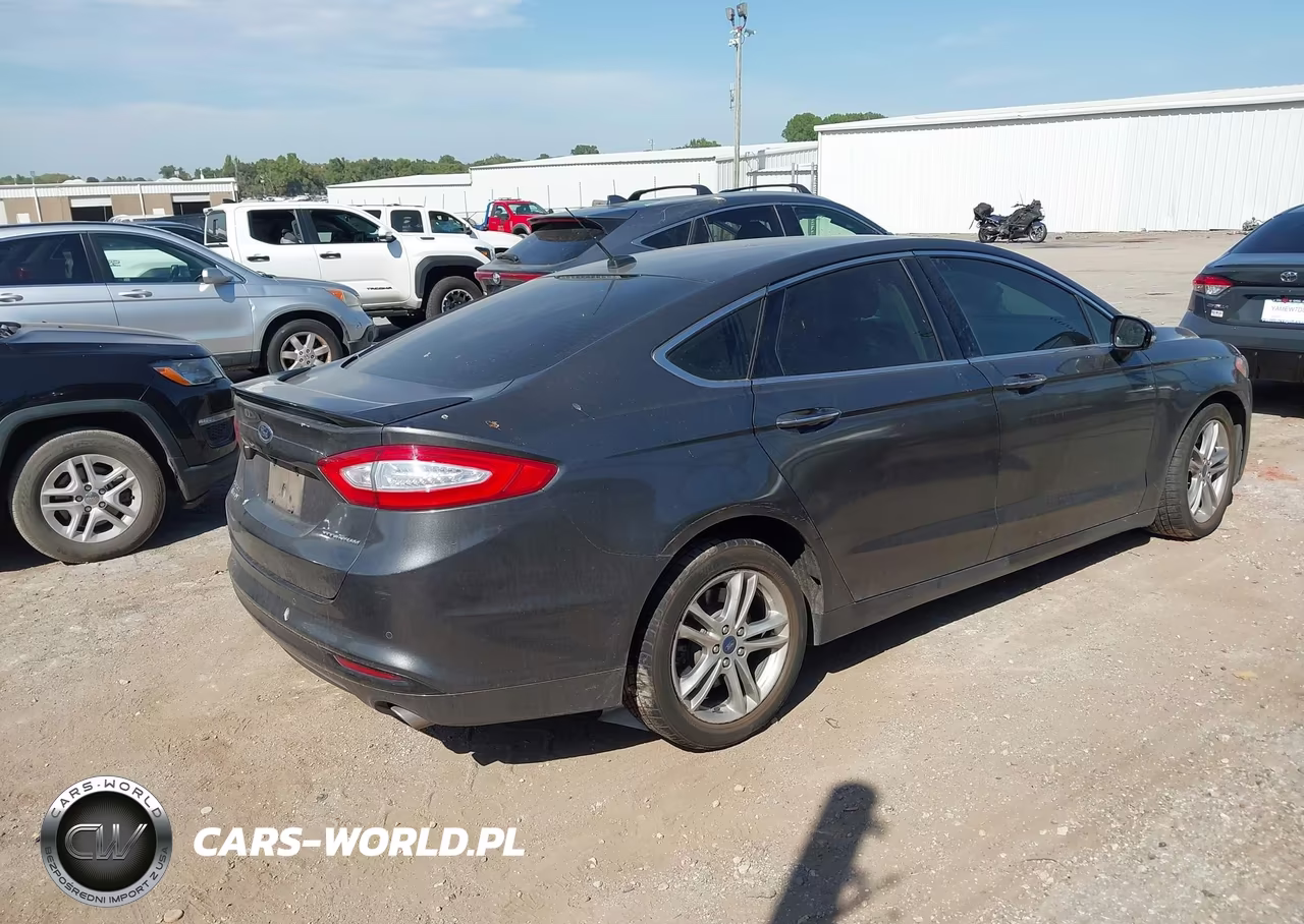 2016 Ford Fusion Energi Titanium VIN:3FA6P0SU5GR115117 - 4