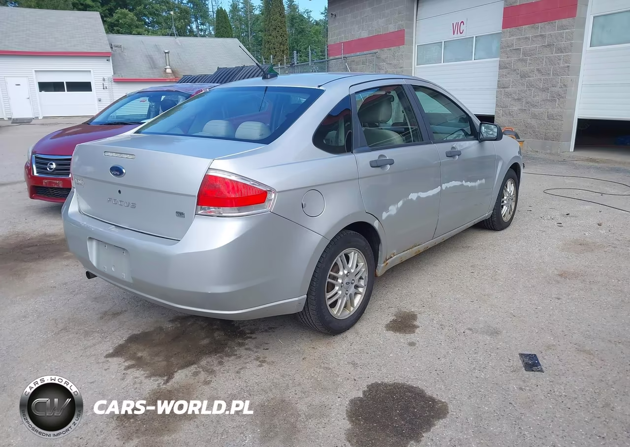 2009 Ford Focus Se VIN:1FAHP35NX9W205703 - 4
