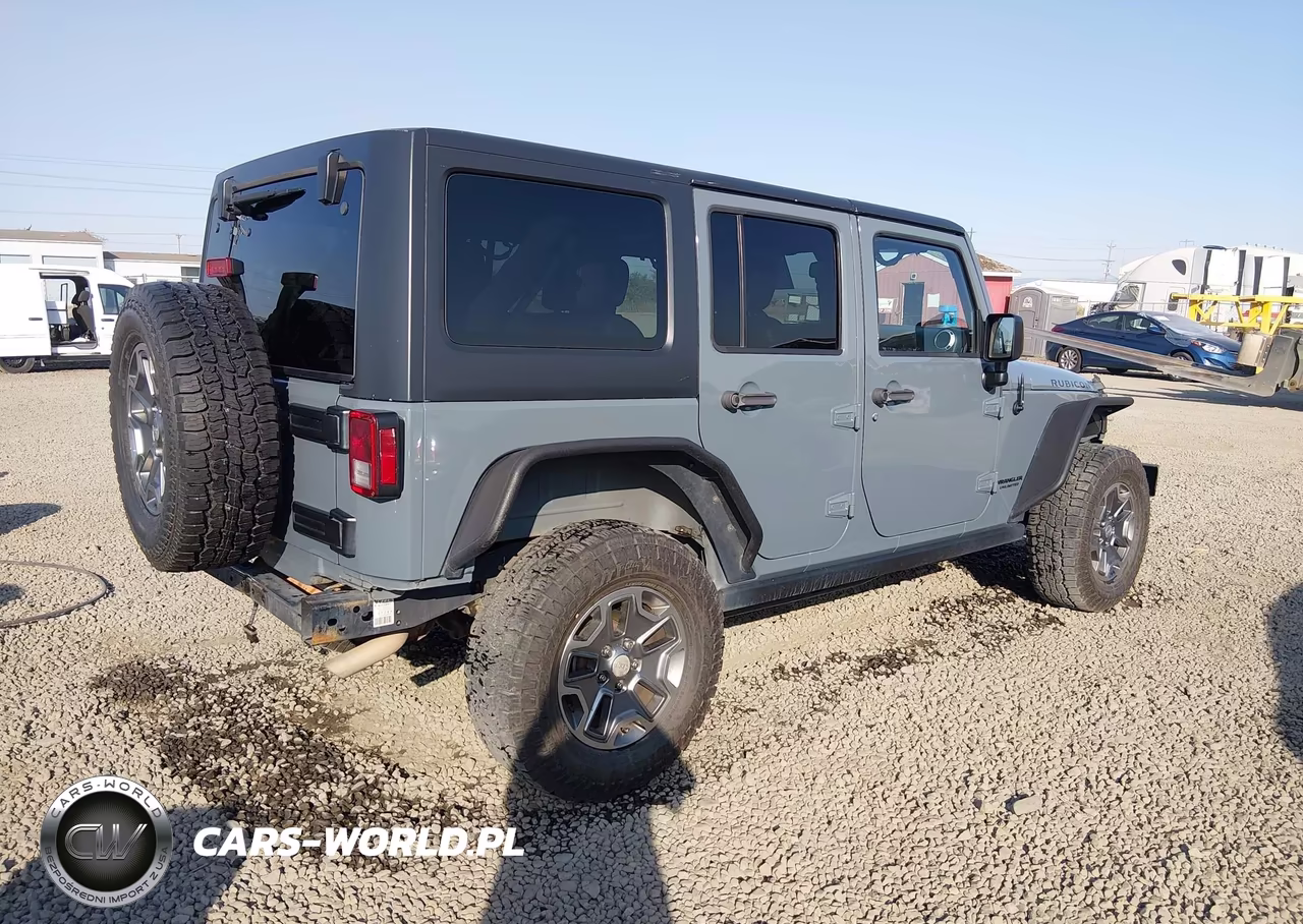 2015 Jeep Wrangler Unlimited Rubicon VIN:1C4HJWFG4FL670410 - 4