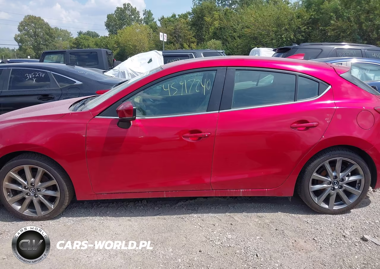 2018 Mazda Mazda3 Touring VIN:3MZBN1L3XJM228802 - 14
