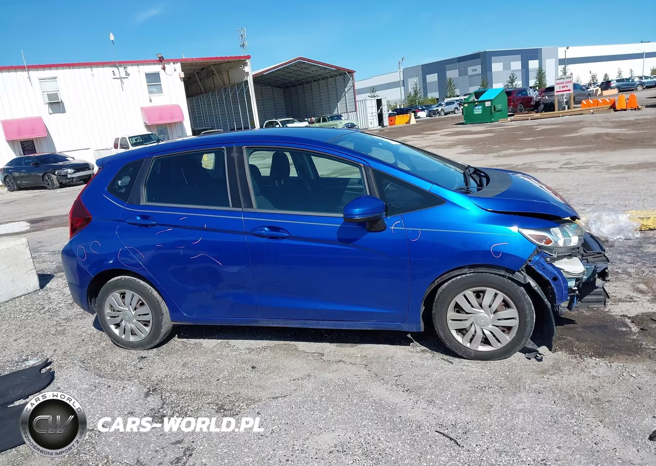 2015 Honda Fit Lx VIN:3HGGK5H57FM748533 - 14