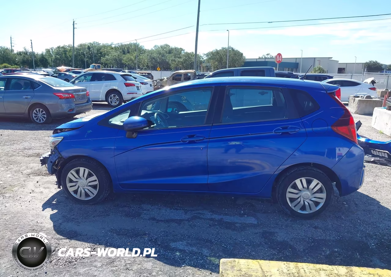 2015 Honda Fit Lx VIN:3HGGK5H57FM748533 - 15
