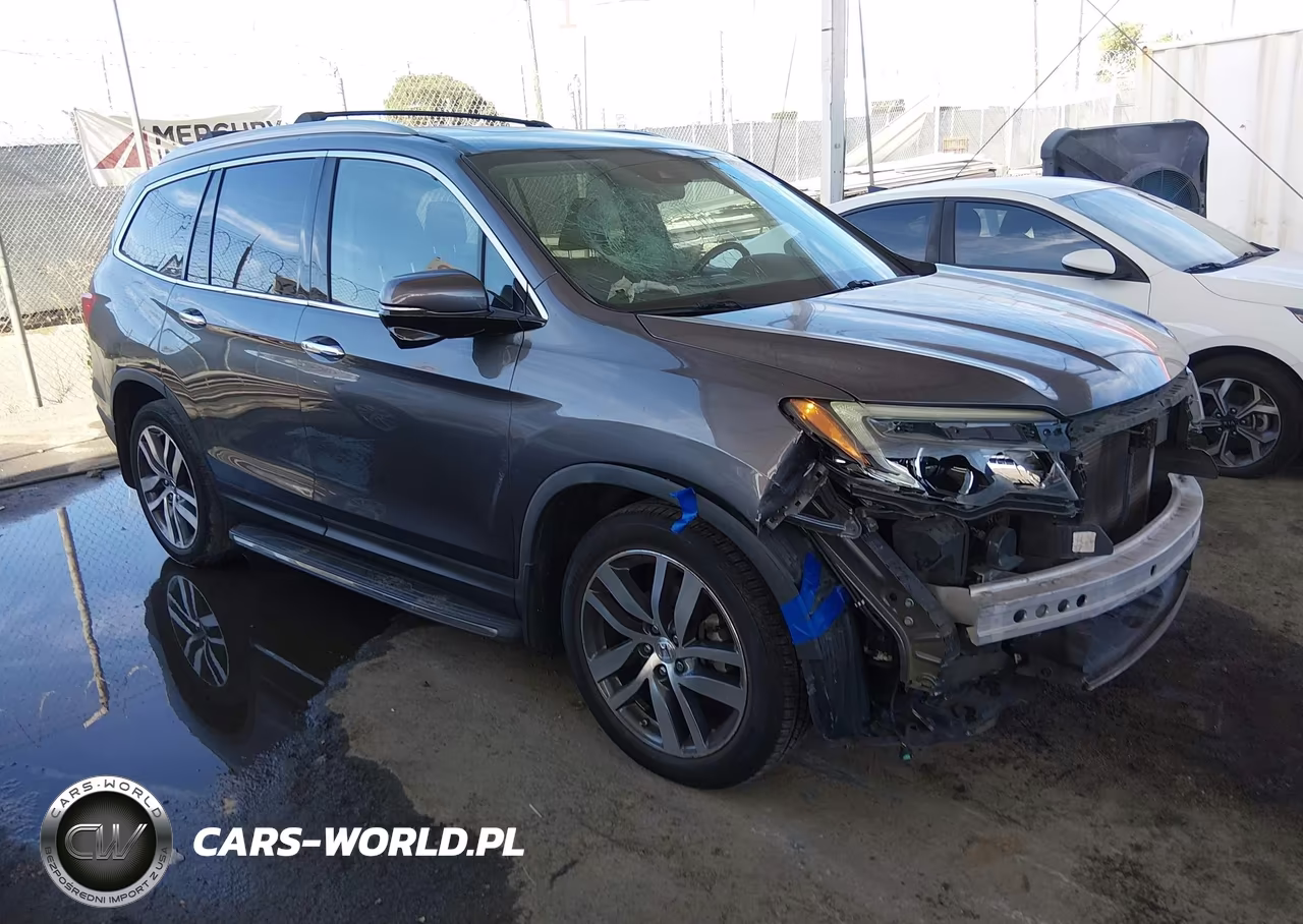2017 Honda Pilot Touring VIN:5FNYF5H90HB023180 - 1