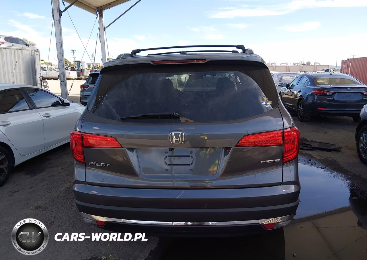 2017 Honda Pilot Touring VIN:5FNYF5H90HB023180 - 17