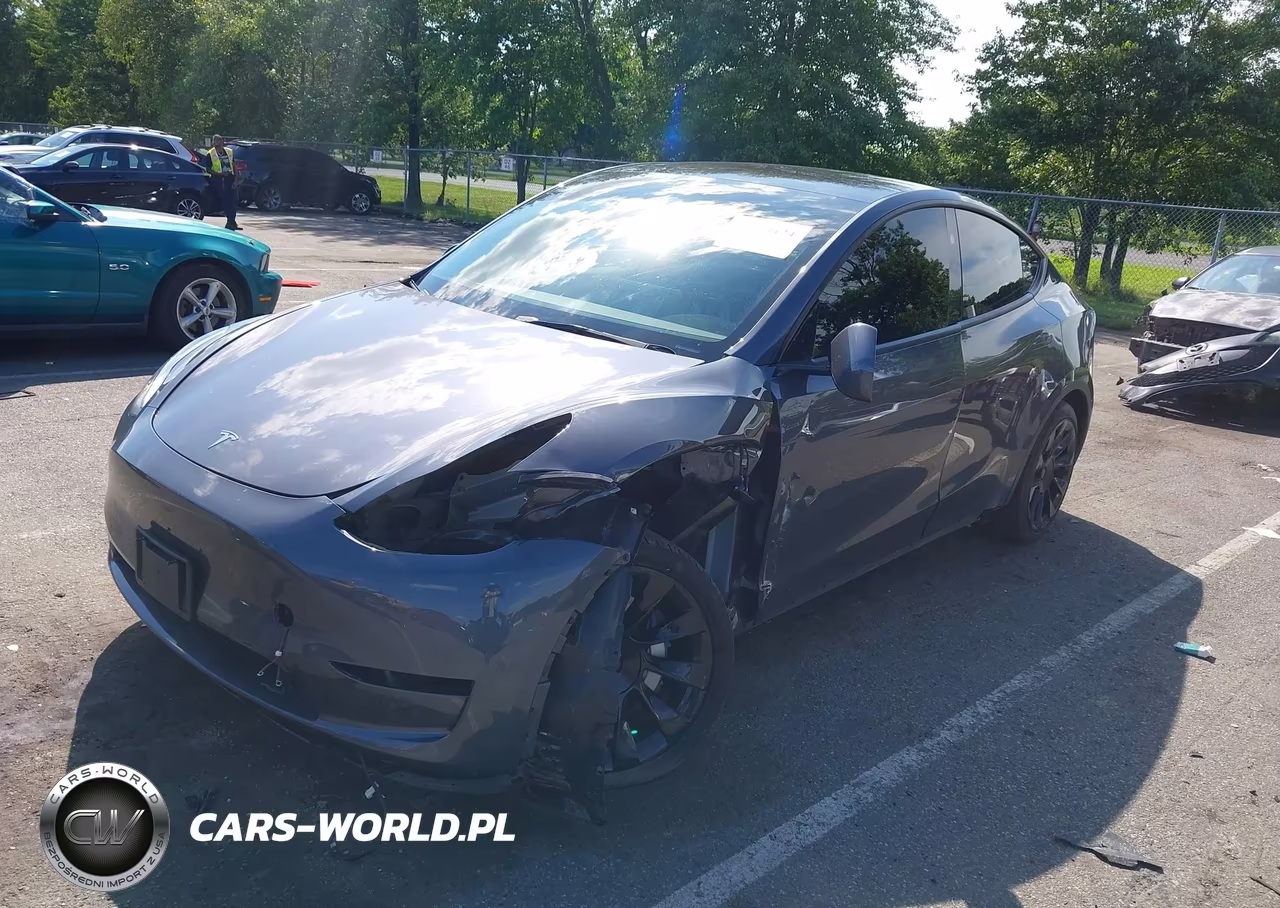 2023 Tesla Model Y Awd-Long Range Dual Motor All-Wheel Drive VIN:7SAYGAEE4PF827720 - 2