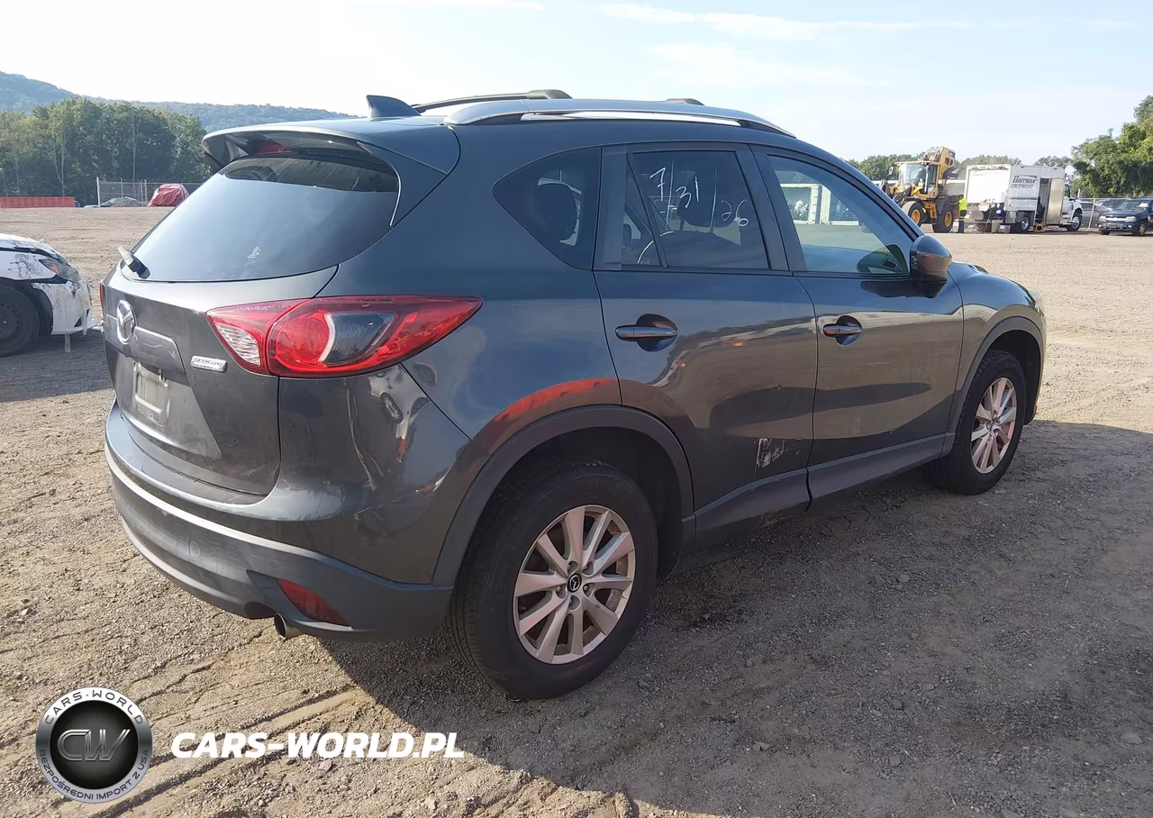 2015 Mazda Cx-5 Touring VIN:JM3KE4CY5F0450665 - 4
