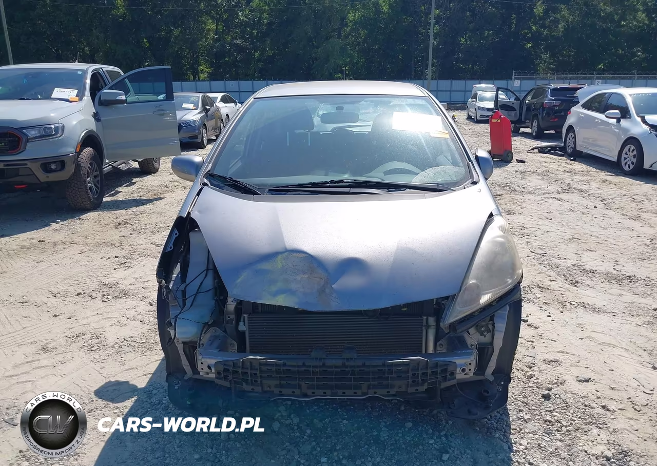 2009 Honda Fit Sport VIN:JHMGE87409S012642 - 13