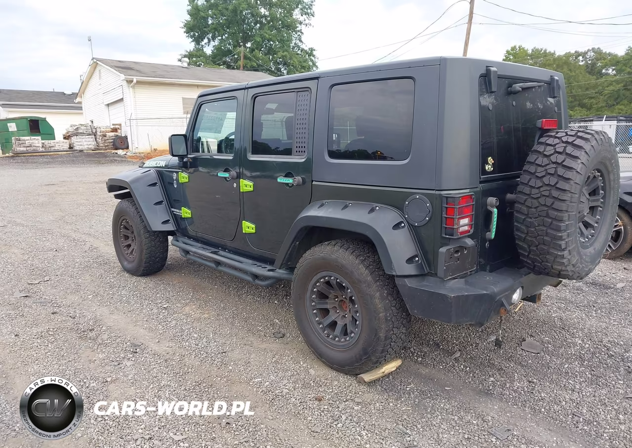 2010 Jeep Wrangler Unlimited Rubicon VIN:1J4HA6H19AL171422 - 3