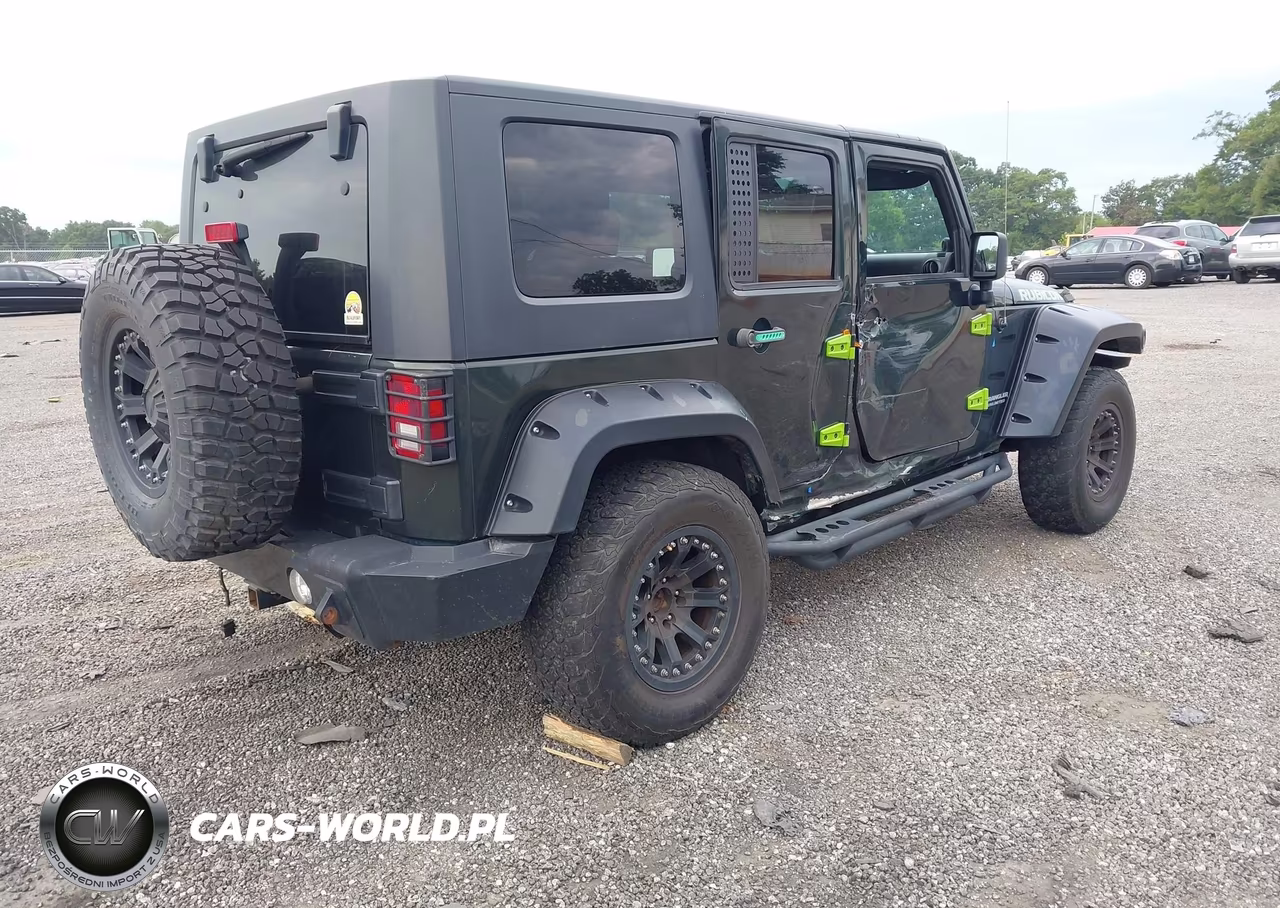 2010 Jeep Wrangler Unlimited Rubicon VIN:1J4HA6H19AL171422 - 4