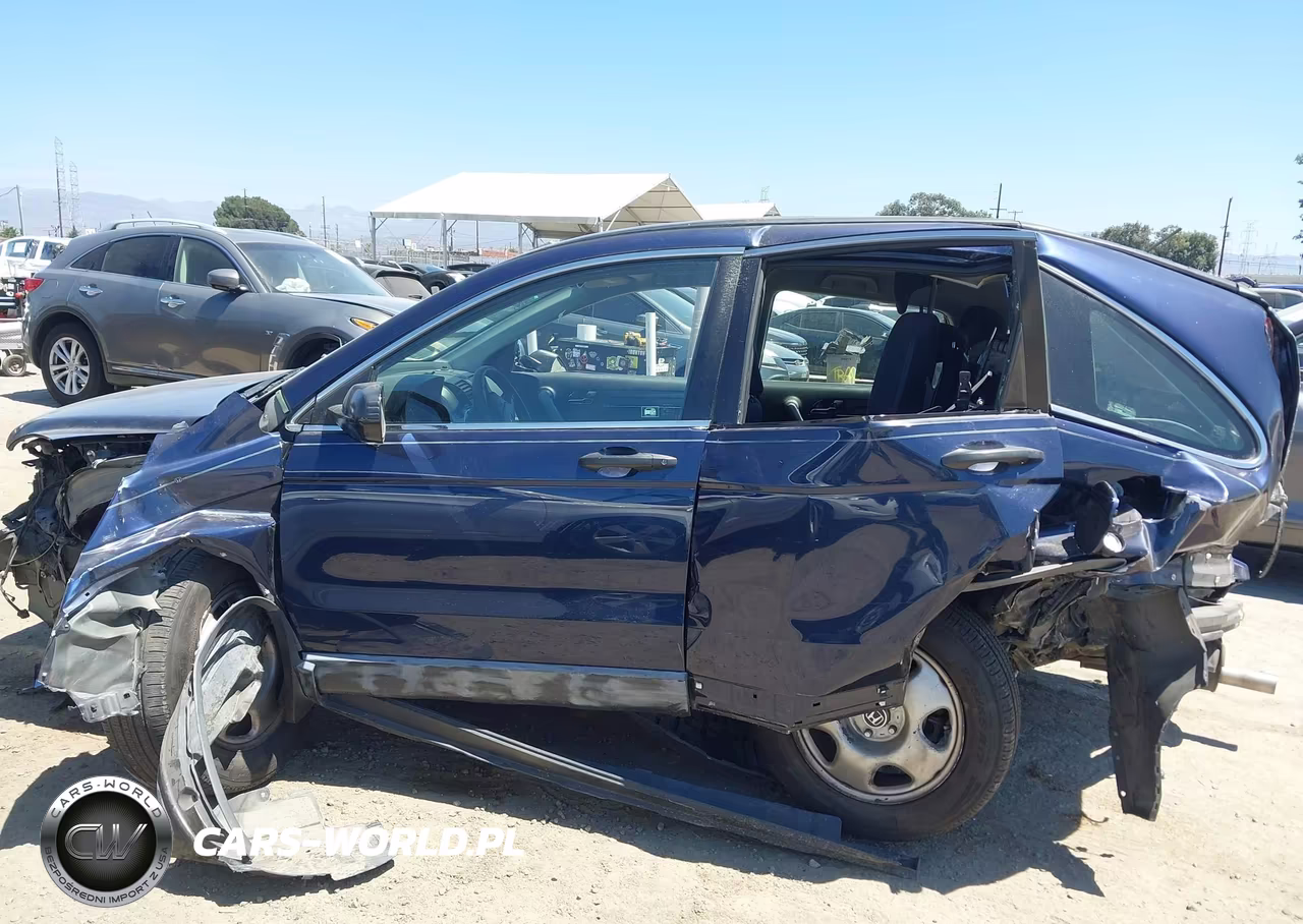 2007 Honda Cr-V Lx VIN:JHLRE383X7C077558 - 14