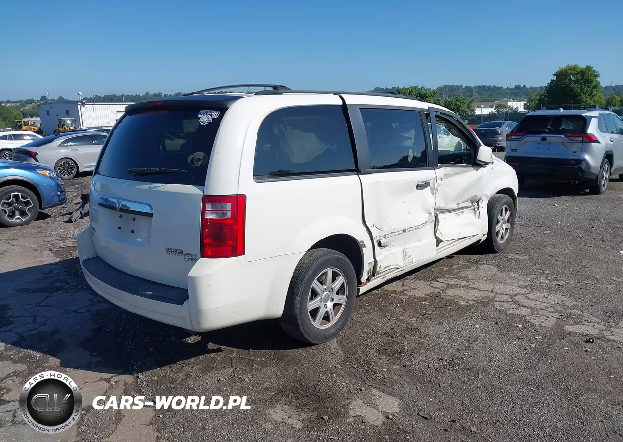 2010 Dodge Grand Caravan Sxt VIN:2D4RN5D10AR256075 - 4